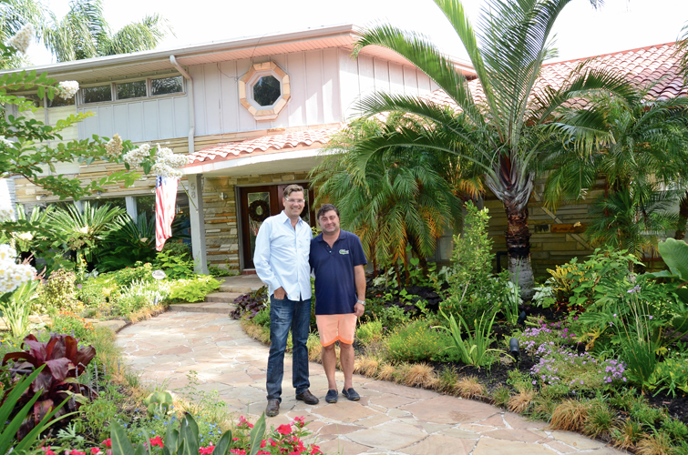 James Stork and Joe Henry outside their remodeled home in the Cedar Lawn neighborhood of Galveston, which is on the National Register of Historic Places.