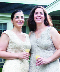 Dee Spagnuolo (left) and Sasha Ballen received the state's first same-sex marriage license. Source: Philly.com