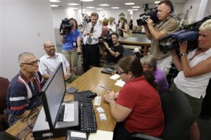 Marcus Saitschenko, left, and James Goldstein obtain a marriage license at a Montgomery County office in Norristown, Pa. Photo: MATT ROURKE/AP Photo