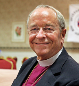 Spirited: New Hampshire Bishop V. Gene Robinson, the first openly gay Episcopal bishop in the global Anglican fellowship, smiles after announcing his retirement at the 2010 diocesan convention in Concord, New Hampshire.