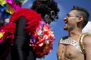 People participate in the annual Gay Pride Parade at Copacabana beach in Rio de Janeiro, Brazil, Sunday, Oct. 13, 2013. Photo: AP Photo/Felipe Dana